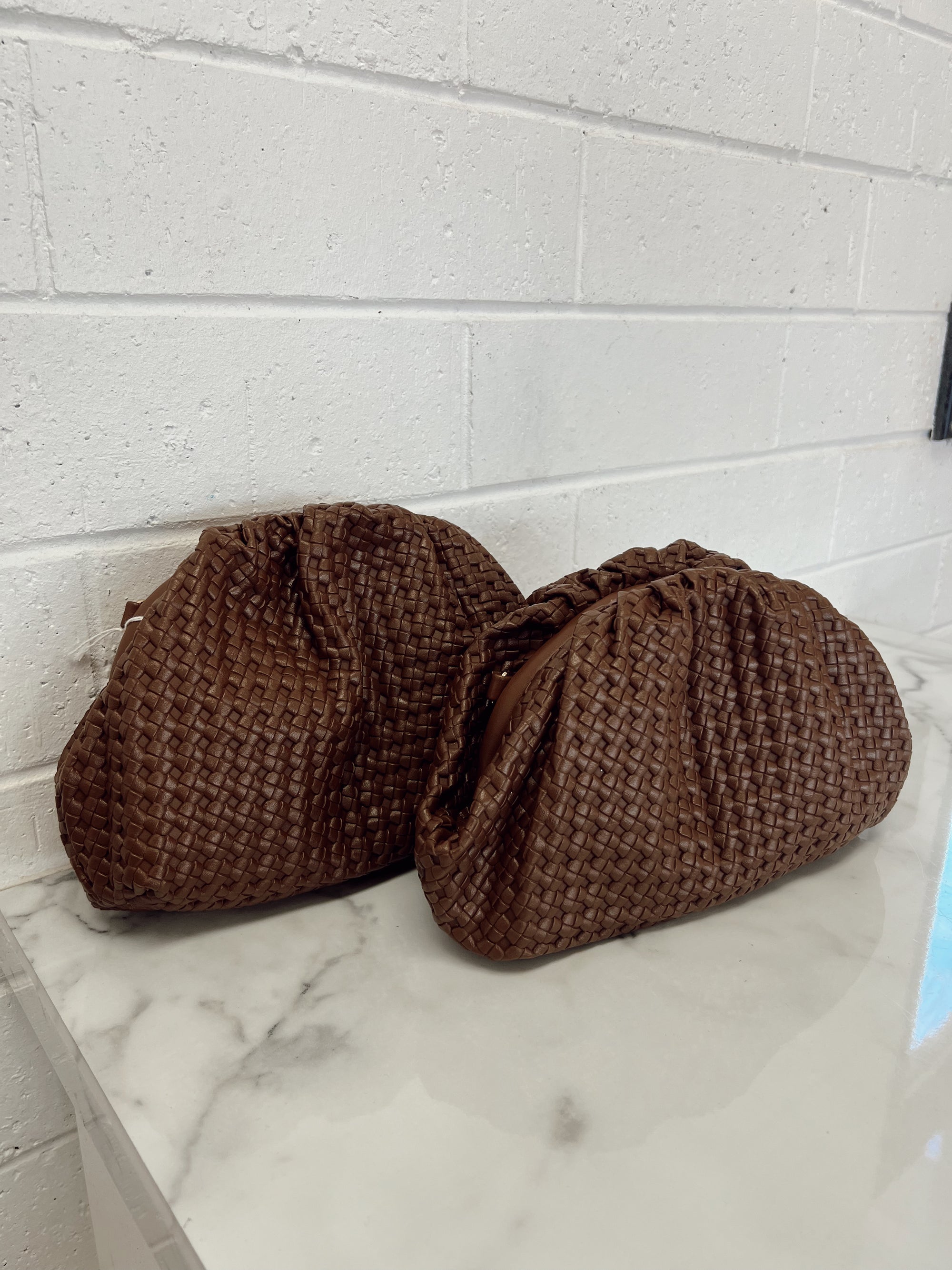 VENETIA WOVEN CLUTCH BAG