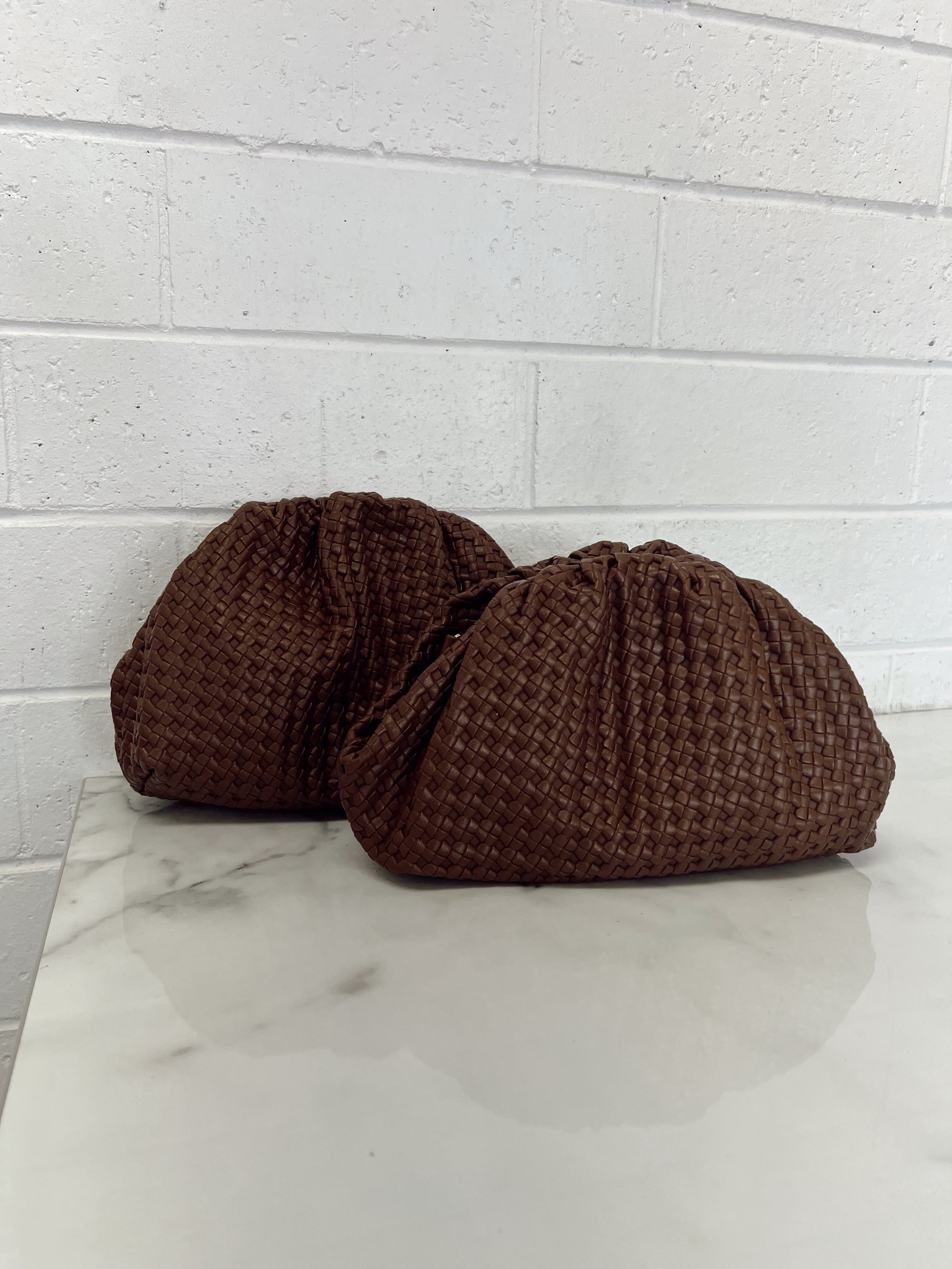 VENETIA WOVEN CLUTCH BAG