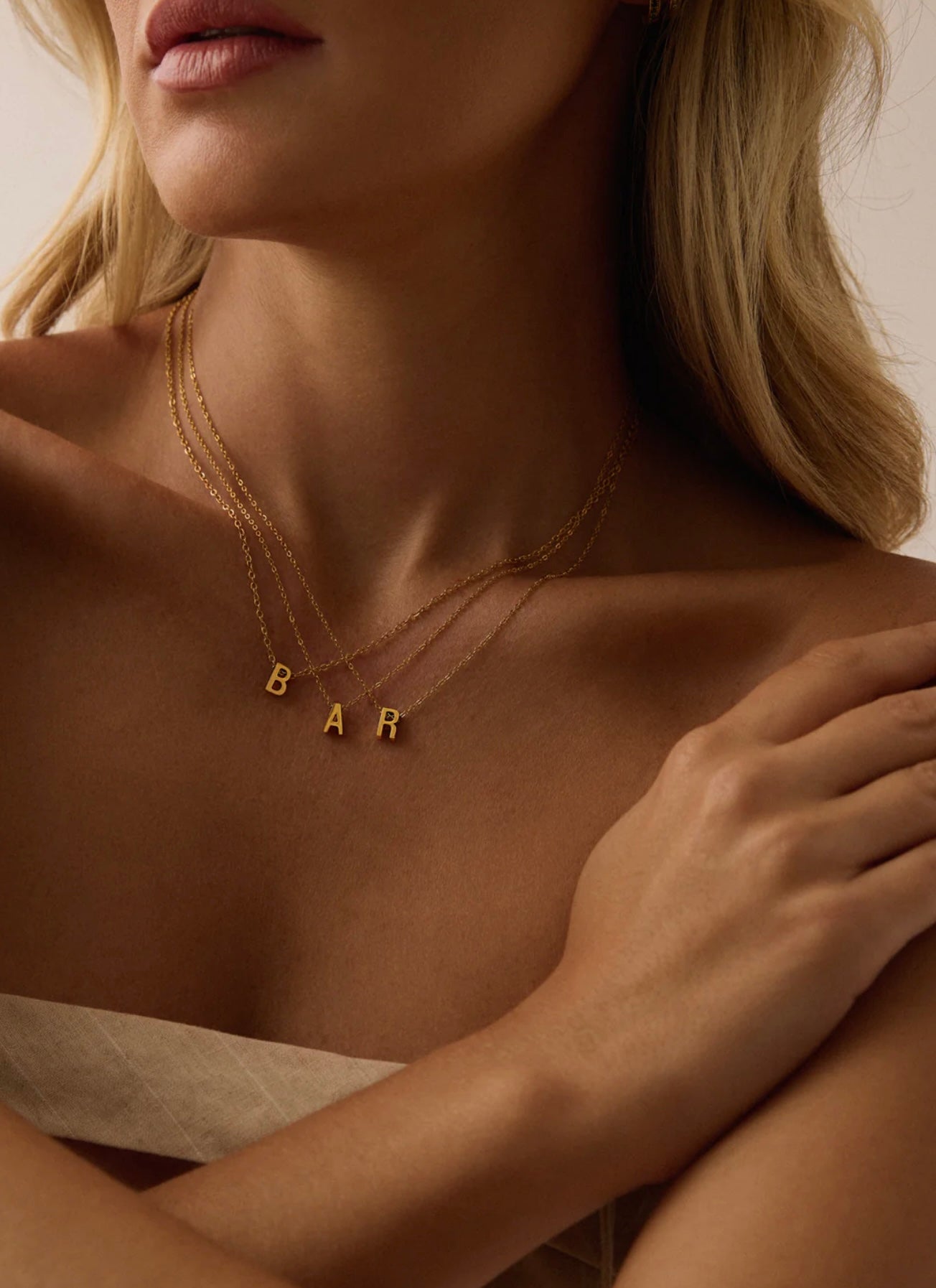 ALPHA INITIAL CHARM NECKLACE